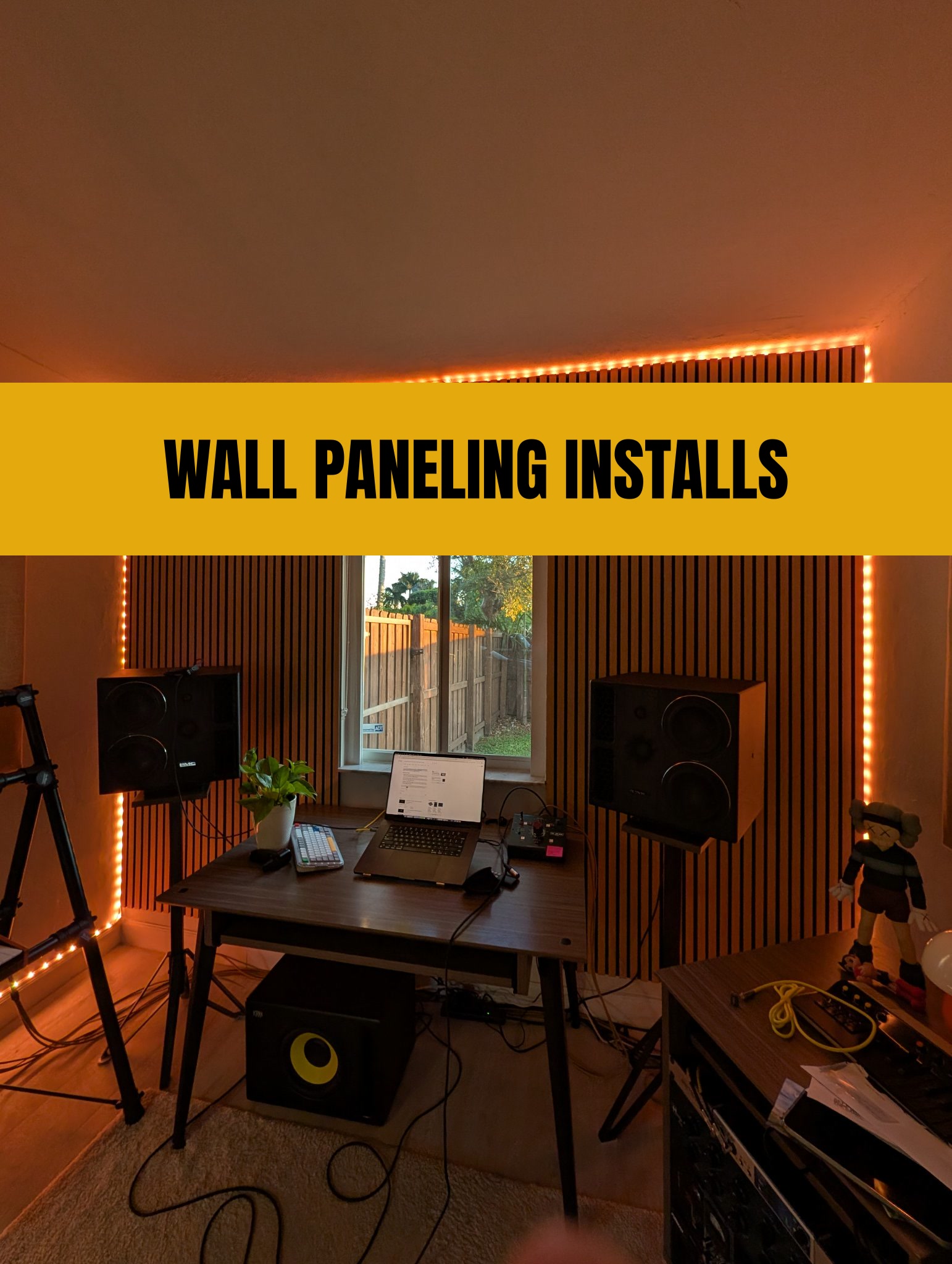 Wood slat accent wall with LED lighting installed by Install Buddies